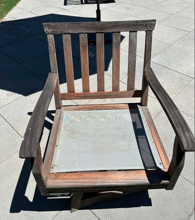 Weathered teak chair restoration before PatioMaid cleaning in San Diego
