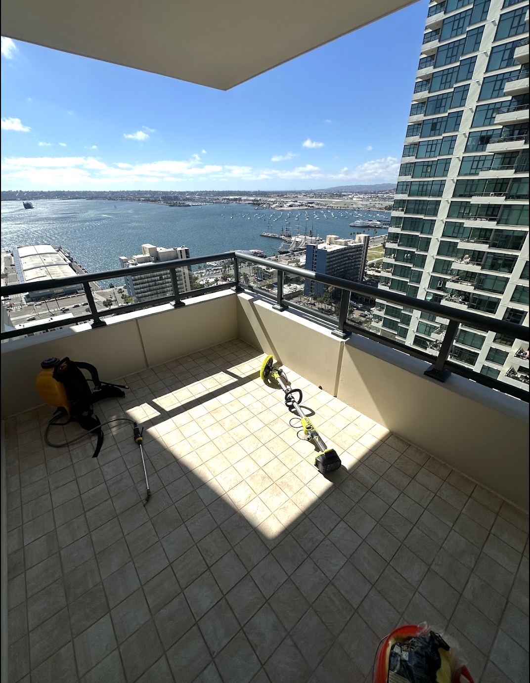 Downtown San Diego balcony during PatioMaid cleaning with bay view