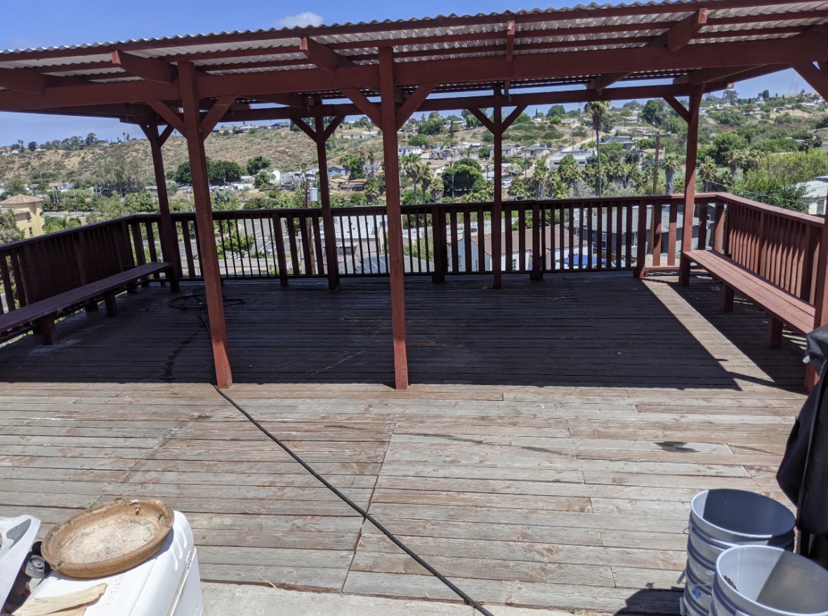 Hillside wood deck restoration before PatioMaid cleaning in San Diego