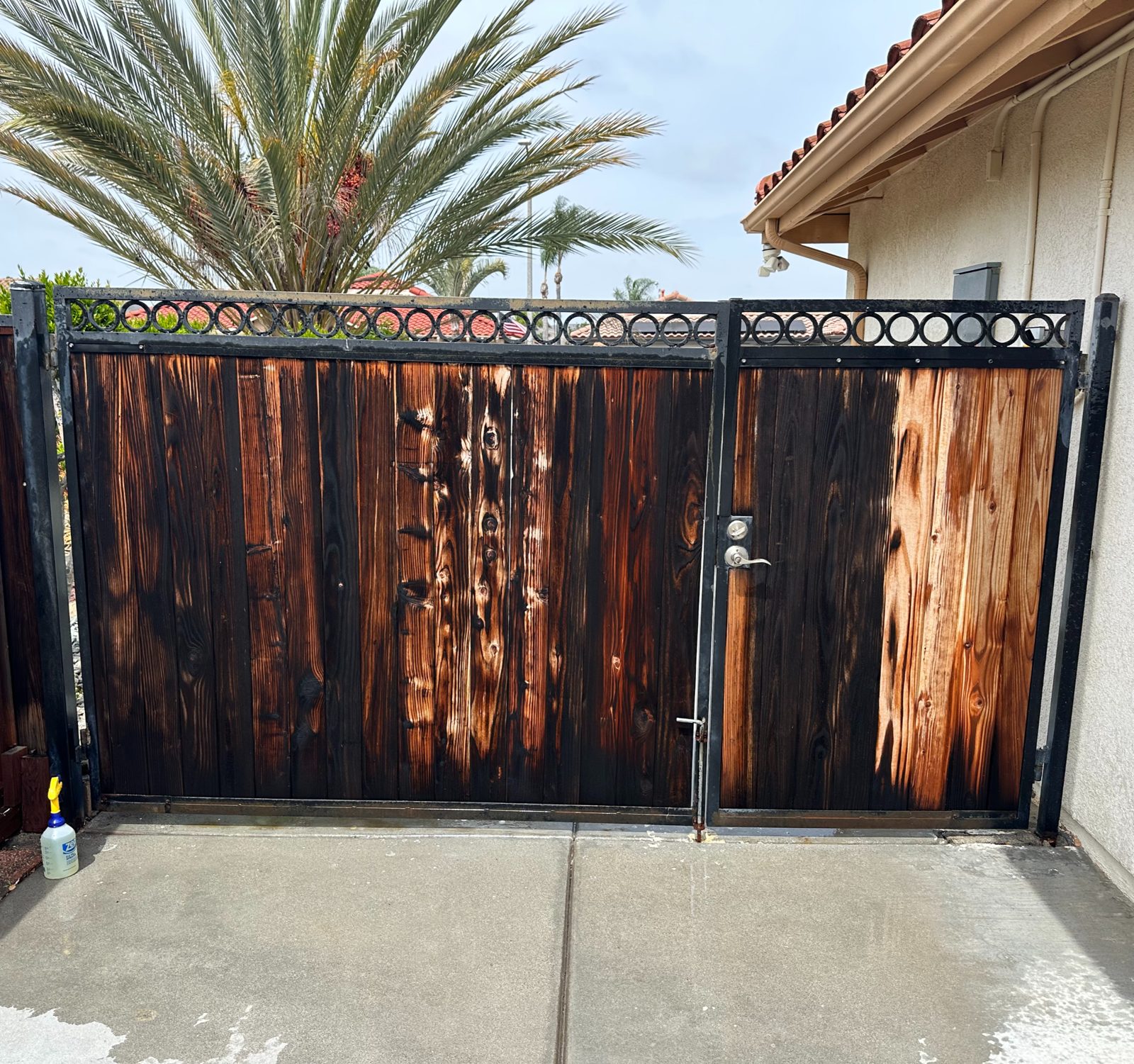 Weathered fence and gate restoration after PatioMaid cleaning in San Diego